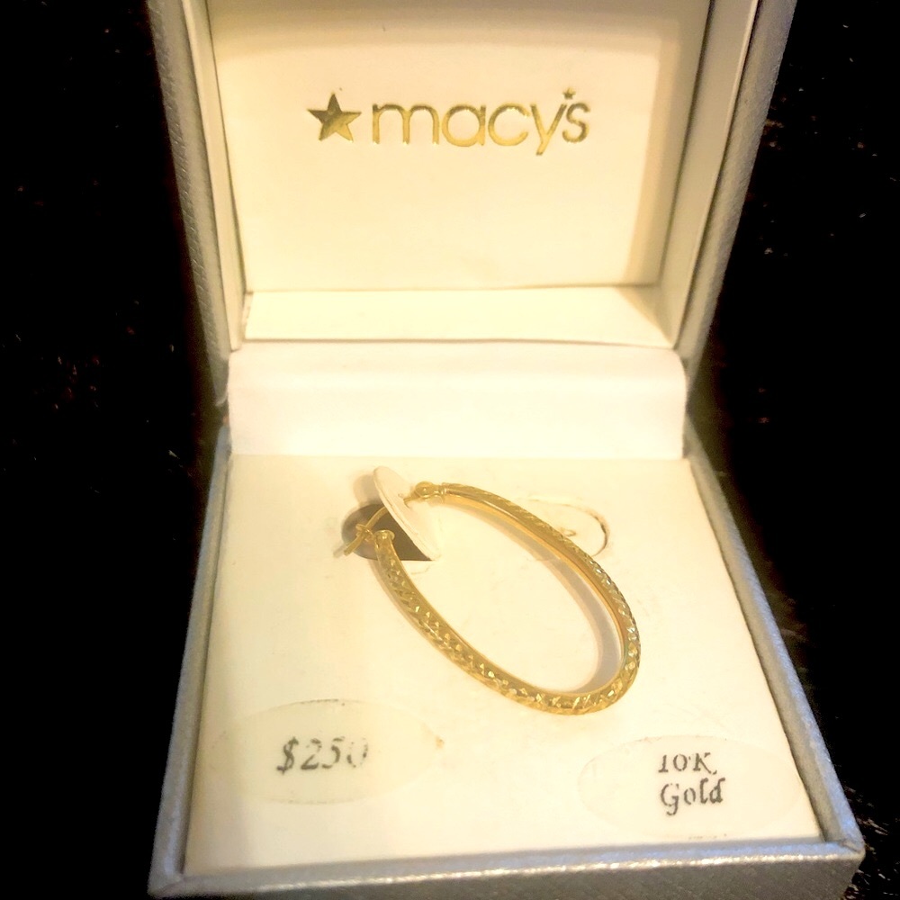 Macy’s 10K Gold hoop earring.